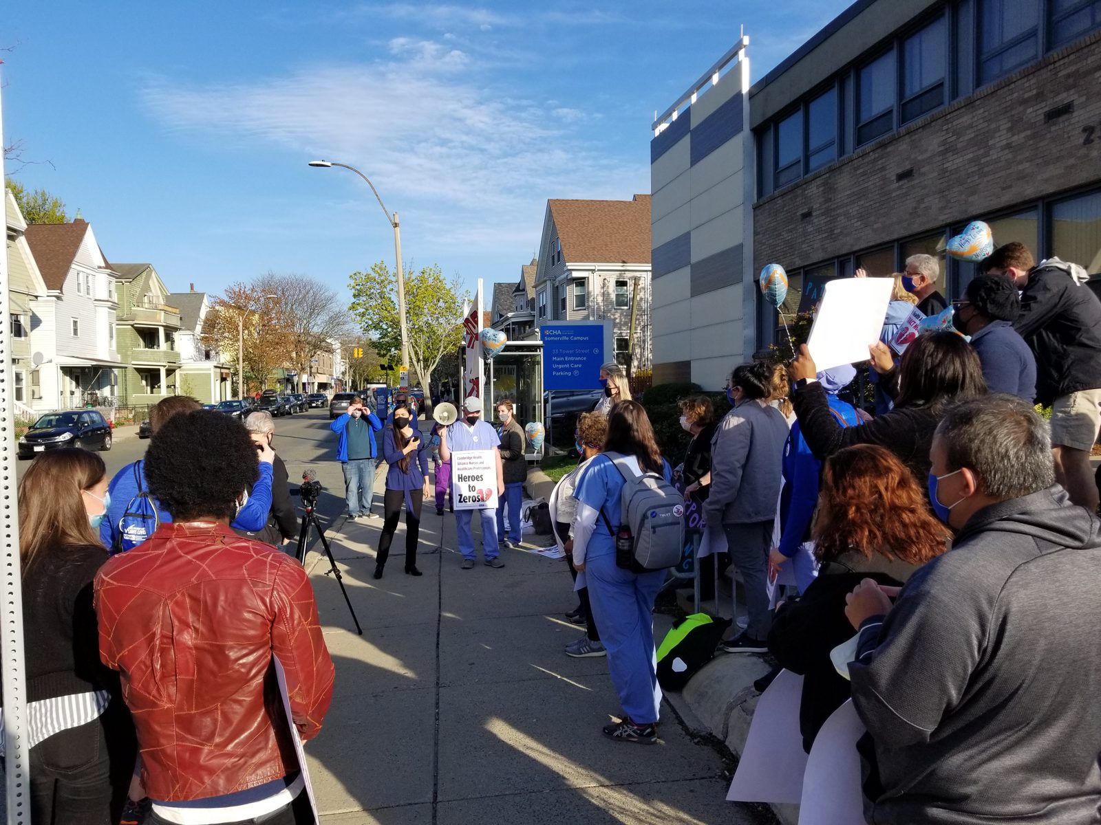 Erika speaking at a rally with Cambridge Health Alliance nurses in Somerville